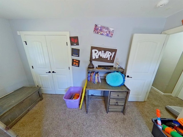 carpeted bedroom with a closet