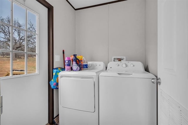 washroom featuring washing machine and dryer