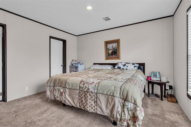 bedroom with carpet and crown molding