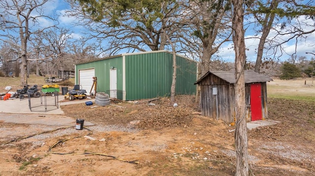 view of outdoor structure featuring a garage