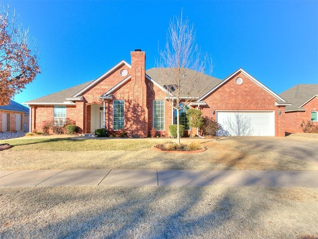 single story home with a garage and a front yard