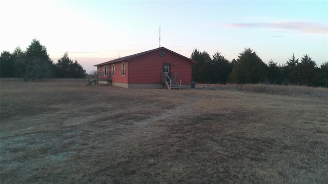 view of property exterior at dusk