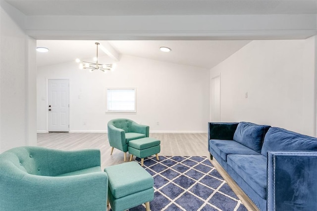 living room featuring hardwood / wood-style flooring, an inviting chandelier, and vaulted ceiling with beams