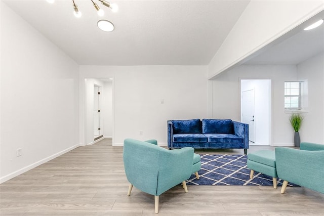 living room with light hardwood / wood-style floors