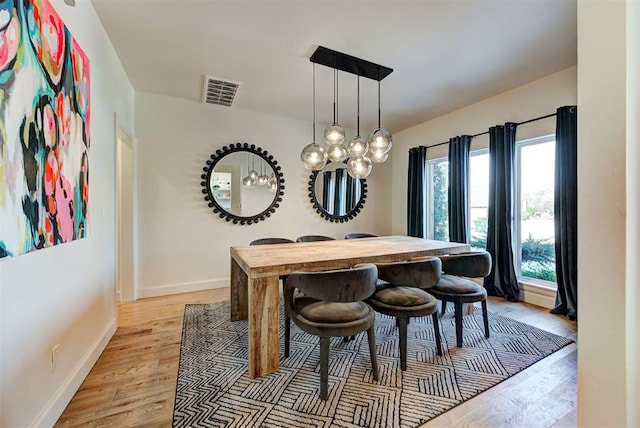 dining room featuring light hardwood / wood-style floors