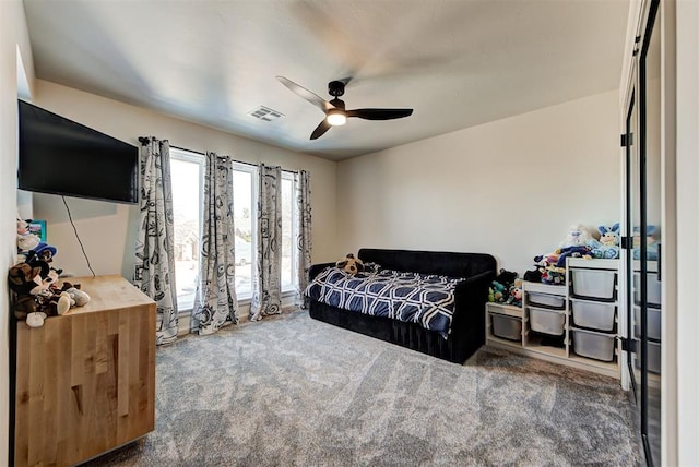 bedroom featuring carpet floors and ceiling fan