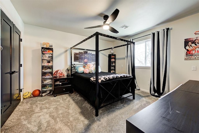 bedroom with light colored carpet and ceiling fan