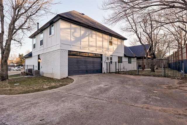 view of side of home with a garage