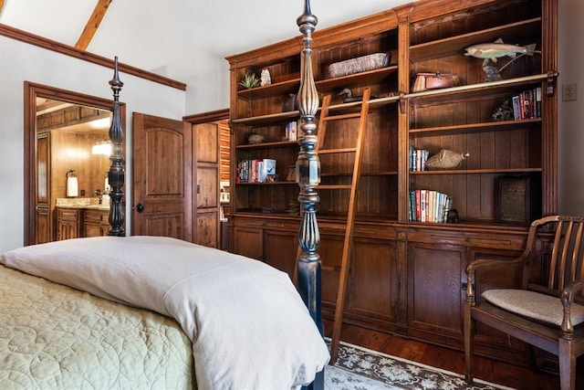 bedroom with hardwood / wood-style flooring