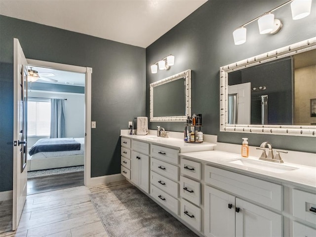 bathroom with vanity and ceiling fan