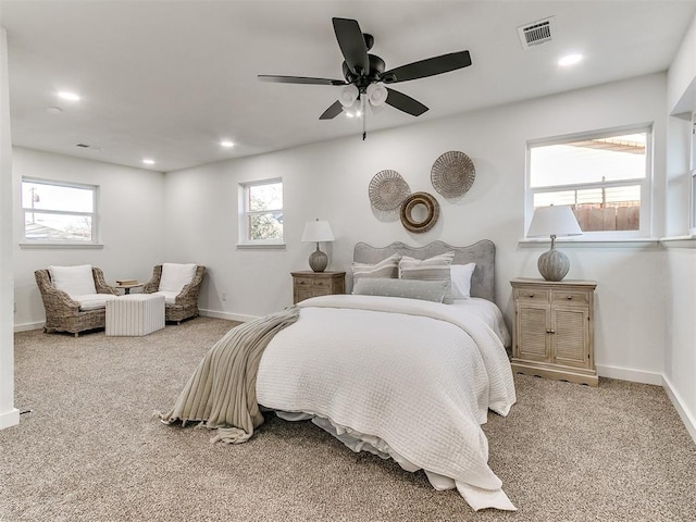 bedroom with ceiling fan and carpet