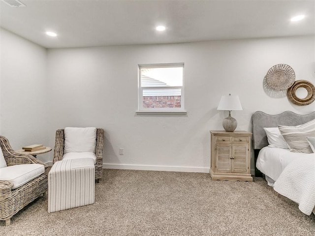 bedroom featuring light colored carpet