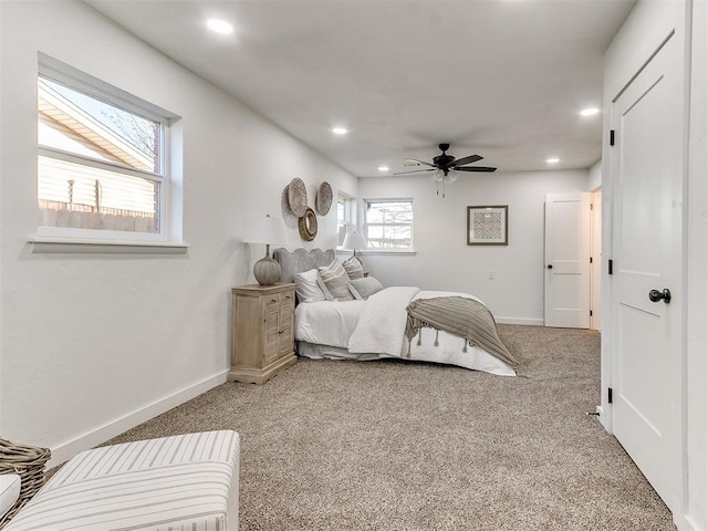 carpeted bedroom featuring ceiling fan