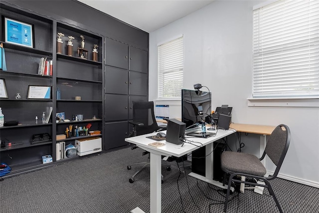 view of carpeted office space