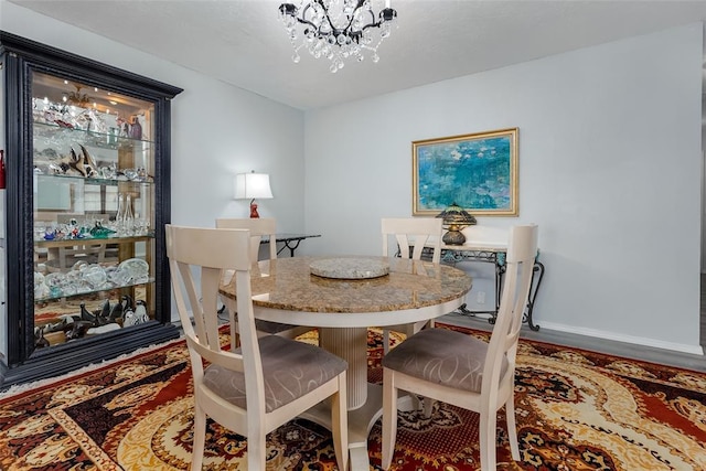 dining room with a chandelier