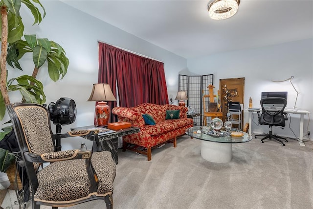 sitting room featuring light colored carpet