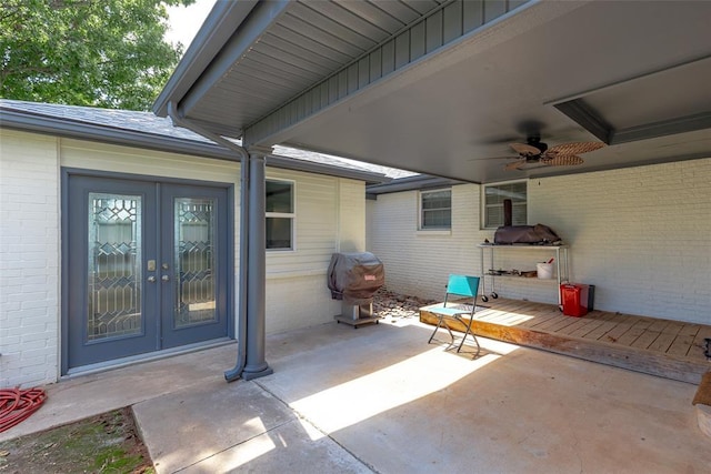 view of patio with area for grilling, ceiling fan, and french doors