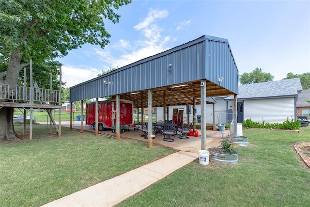 exterior space with a yard and an outdoor structure