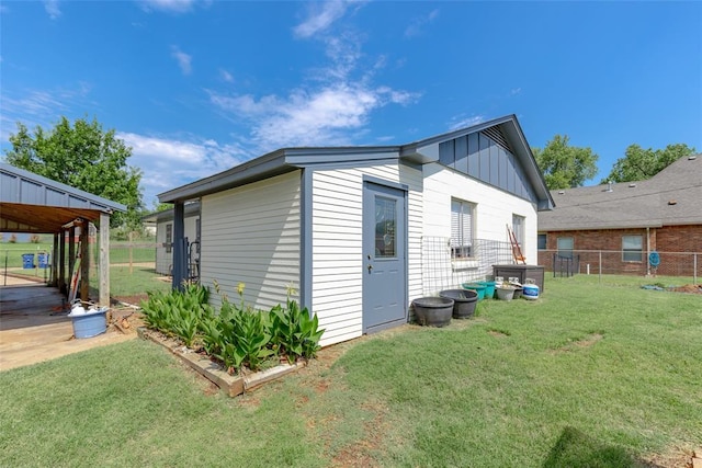 view of home's exterior featuring a lawn