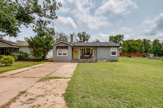 1815 N Bell Ave, Shawnee, OK 74804 - ranch-style house with a chimney, covered porch, and driveway