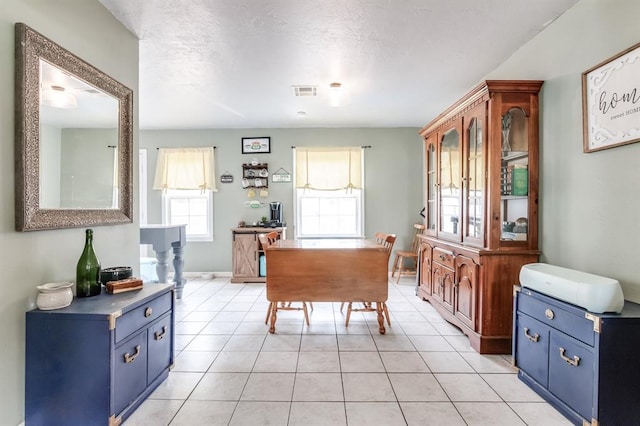 1815 N Bell Ave, Shawnee, OK 74804 - dining room with light tile patterned floors