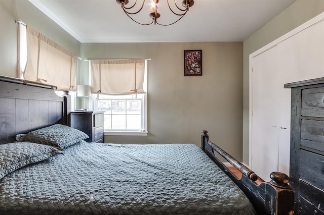 1815 N Bell Ave, Shawnee, OK 74804 - bedroom featuring a chandelier