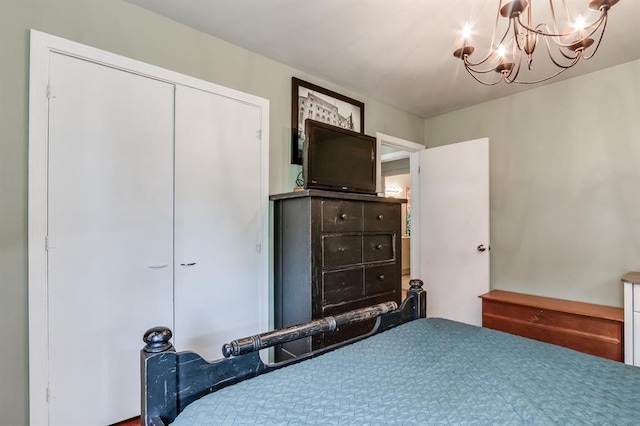 1815 N Bell Ave, Shawnee, OK 74804 - bedroom featuring a chandelier and a closet