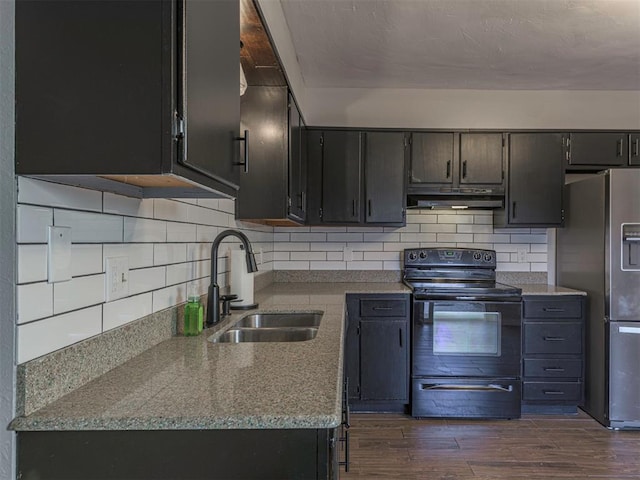 kitchen featuring black electric range oven, sink, stainless steel refrigerator with ice dispenser, tasteful backsplash, and dark hardwood / wood-style flooring