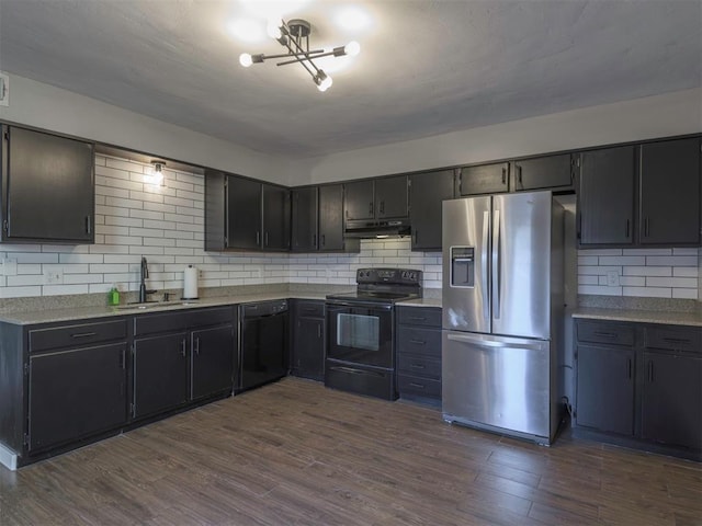 kitchen featuring sink, decorative backsplash, dark hardwood / wood-style floors, and black appliances