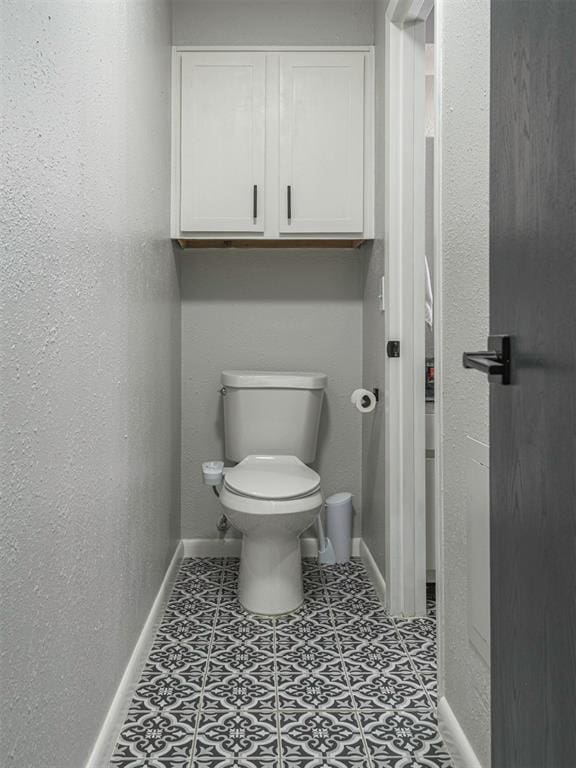 bathroom featuring toilet