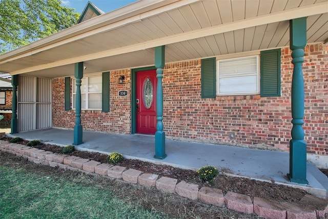 entrance to property with a porch