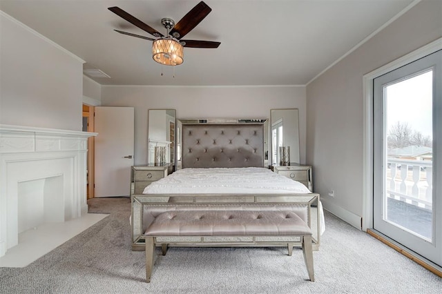 bedroom featuring ceiling fan, access to exterior, light colored carpet, and crown molding