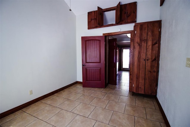 empty room with light tile patterned flooring