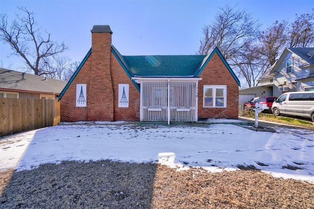 view of snow covered house