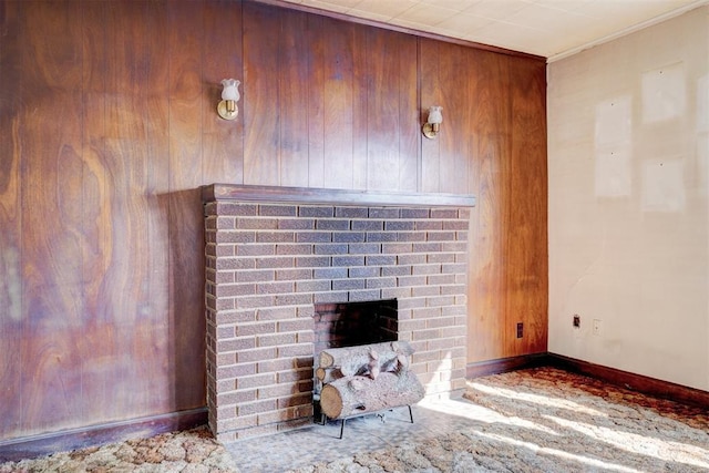 details featuring a fireplace and wood walls