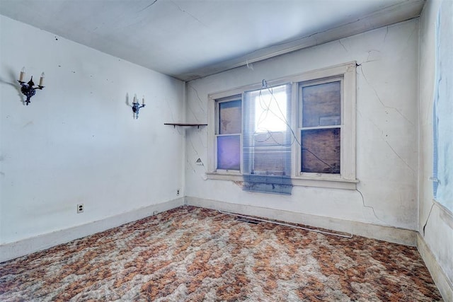 view of carpeted spare room