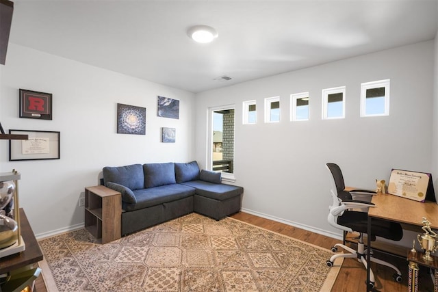 office with hardwood / wood-style floors