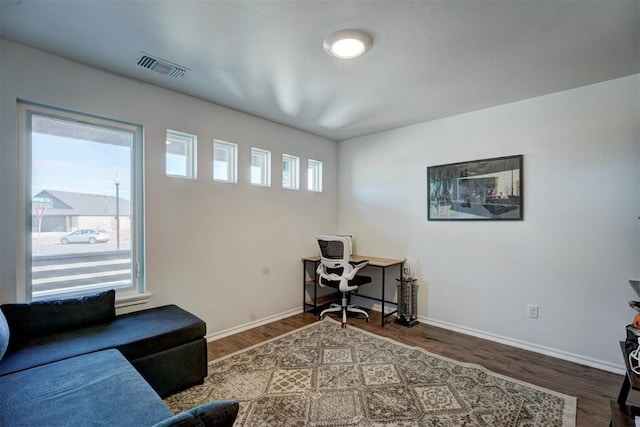 office space with hardwood / wood-style floors