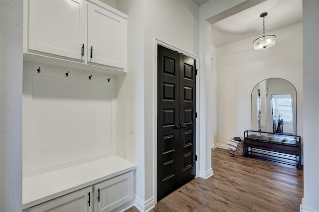 mudroom featuring wood-type flooring