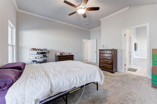 bedroom featuring ceiling fan, light carpet, connected bathroom, and ornamental molding