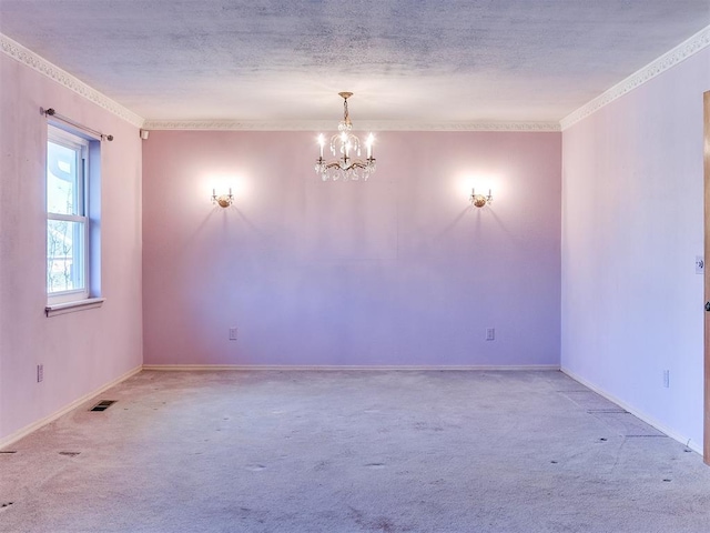 carpeted empty room with a textured ceiling and a notable chandelier