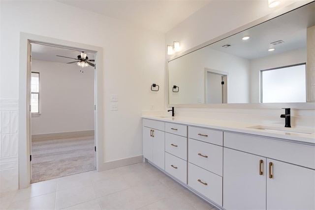 bathroom featuring vanity, tile patterned flooring, and ceiling fan