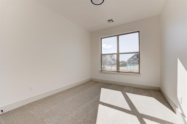 view of carpeted spare room