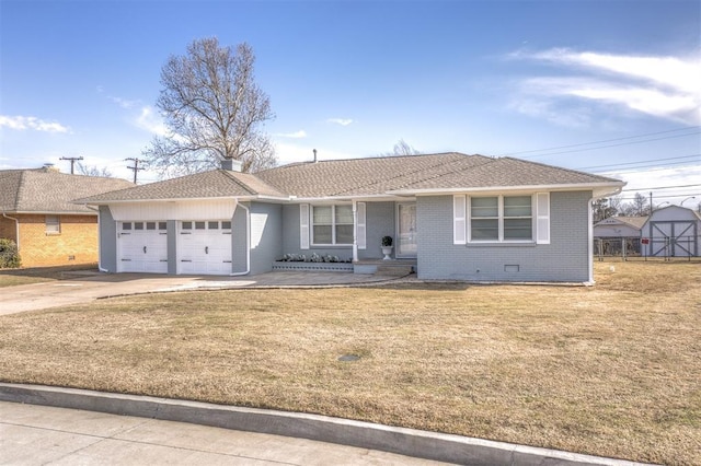 ranch-style home featuring a garage, a front lawn, and a porch