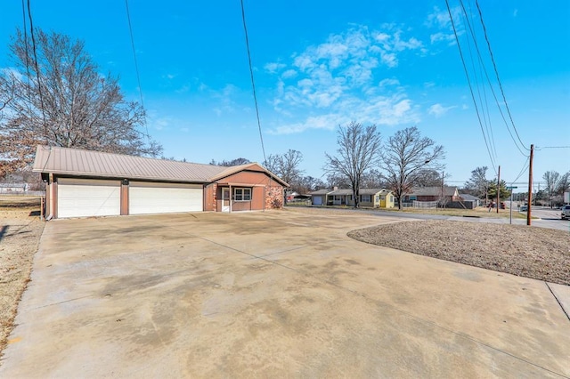 exterior space with a garage