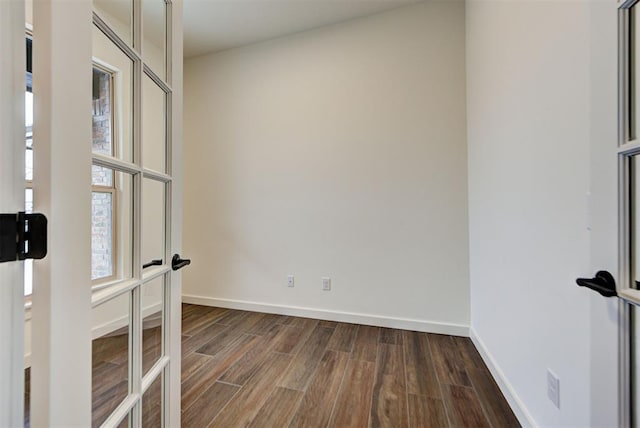 unfurnished room with french doors