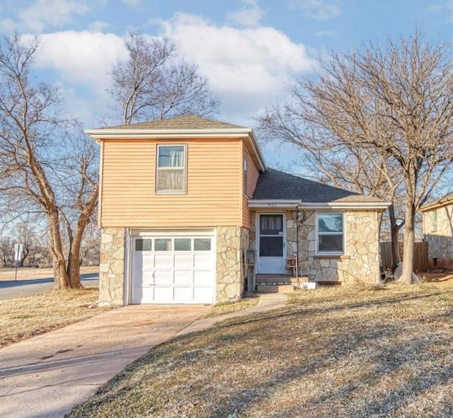 view of front of property with a garage