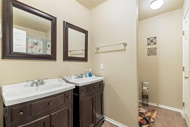 bathroom featuring vanity and tile patterned floors