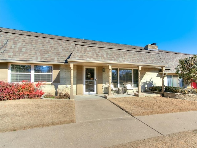 ranch-style house with a patio area