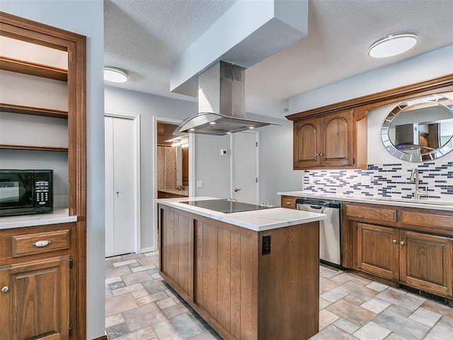 kitchen with island range hood, sink, decorative backsplash, a center island, and black appliances